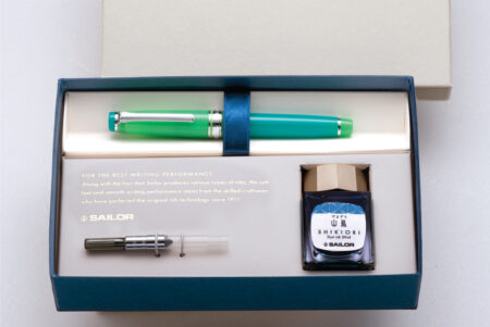 Sailor Pro Gear Slim Fountain Pen - Aurora Borealis in box packaging with ink bottle and converter