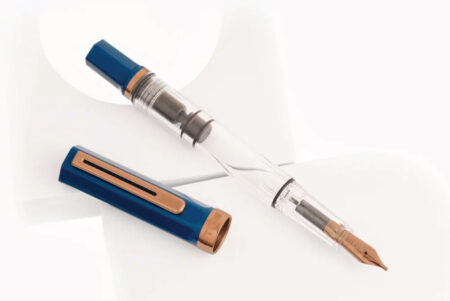 TWSBI ECO Fountain Pen - Indigo Blue with Bronze uncapped, cap next to pen