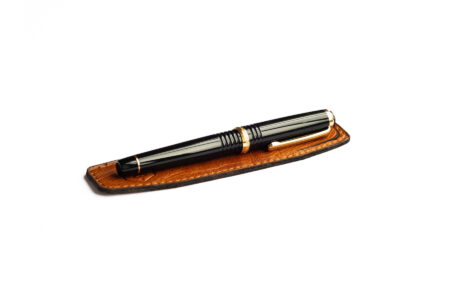 Write GEAR Leather Single Pen Sleeve - Angled tan pen sleeve with pen